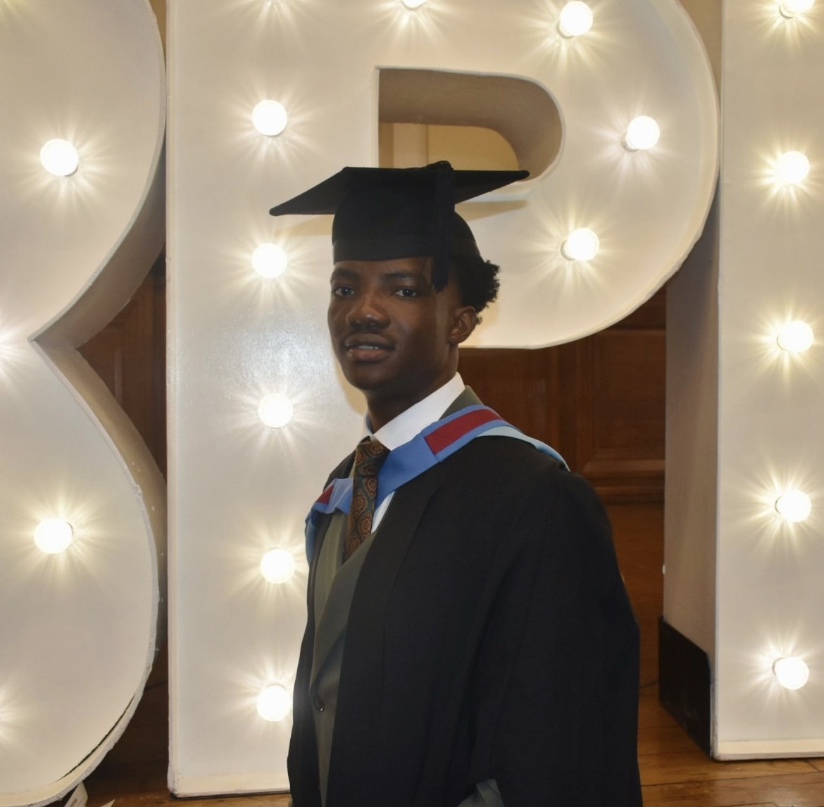 Graduate in cap and gown