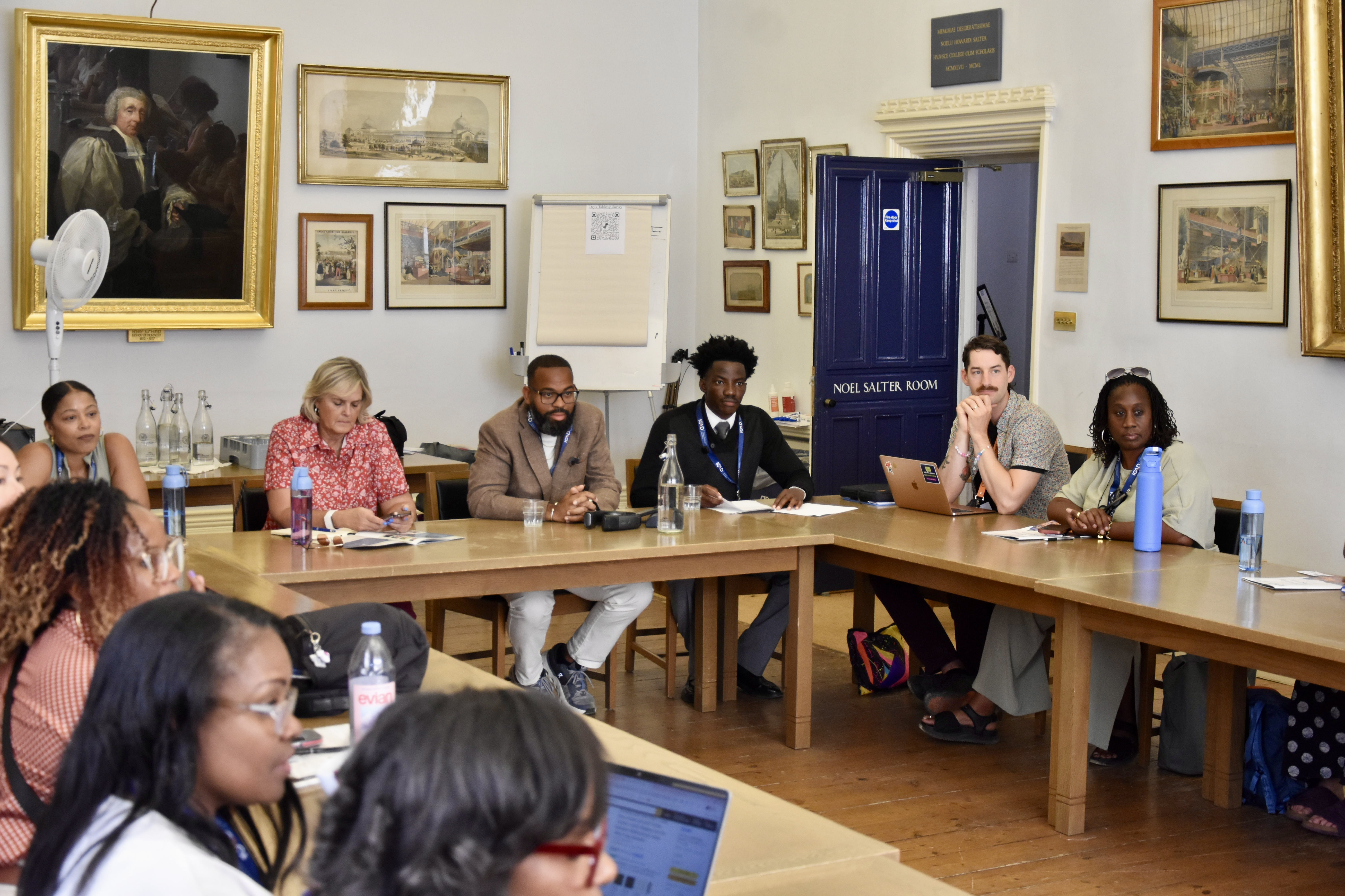 Delegates and facilitators, including Iyioluwa Adesan and Taikein Cooper, in session at ICAD 2026, University of Oxford